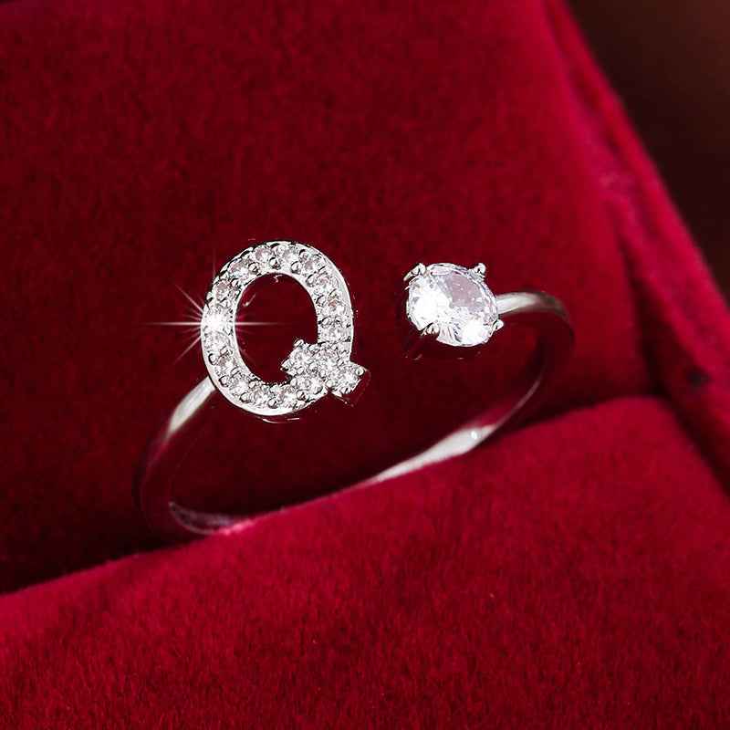Fashionable 26 English Letters Four-Prong Synthetic Synthetic Zirconia Open Adjustment Ring Ｑ Silvery