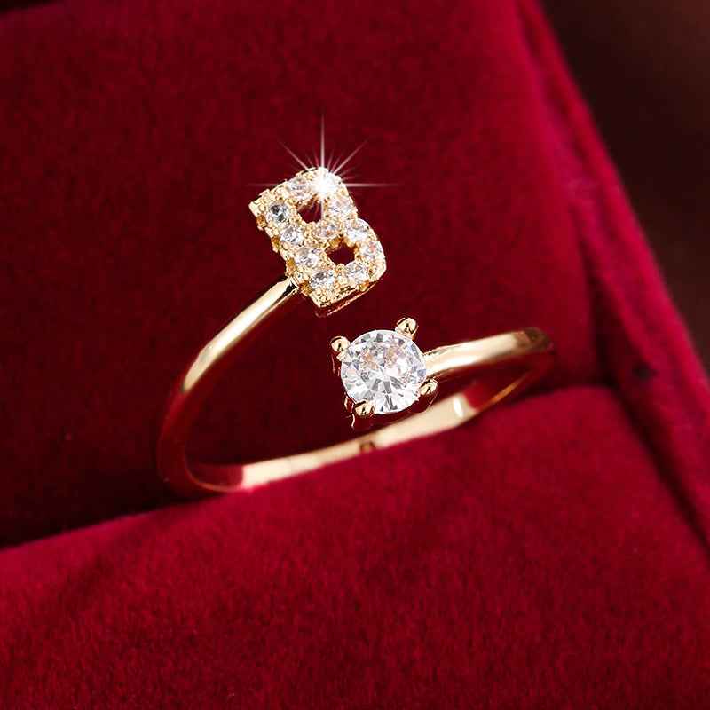 Fashionable 26 English Letters Four-Prong Synthetic Synthetic Zirconia Open Adjustment Ring B Golden