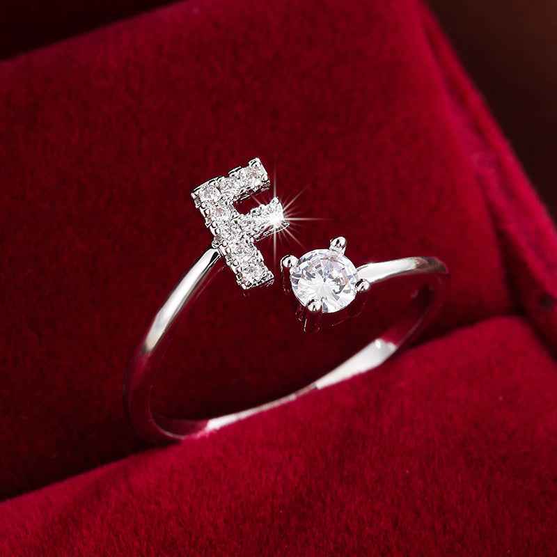 Fashionable 26 English Letters Four-Prong Synthetic Synthetic Zirconia Open Adjustment Ring F Silvery