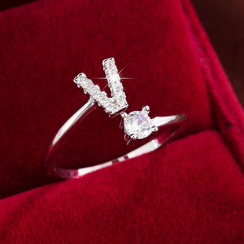 Fashionable 26 English Letters Four-Prong Synthetic Synthetic Zirconia Open Adjustment Ring Ｖ Silvery
