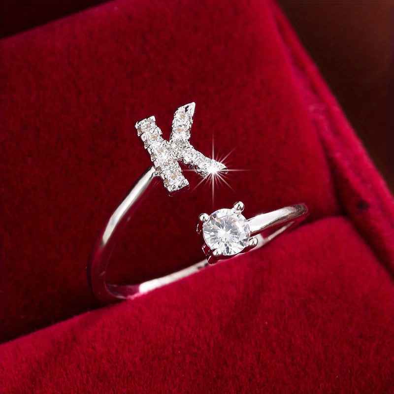 Fashionable 26 English Letters Four-Prong Synthetic Synthetic Zirconia Open Adjustment Ring Ｋ Silvery