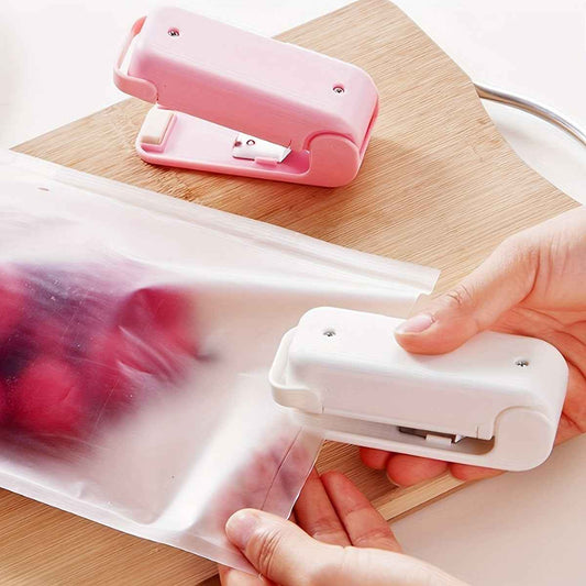 Mini Vacuum Food Sealer - Cordless Portable Handheld Device with One-Touch Seal System & Low-Loss Heating Technology in White/Pink