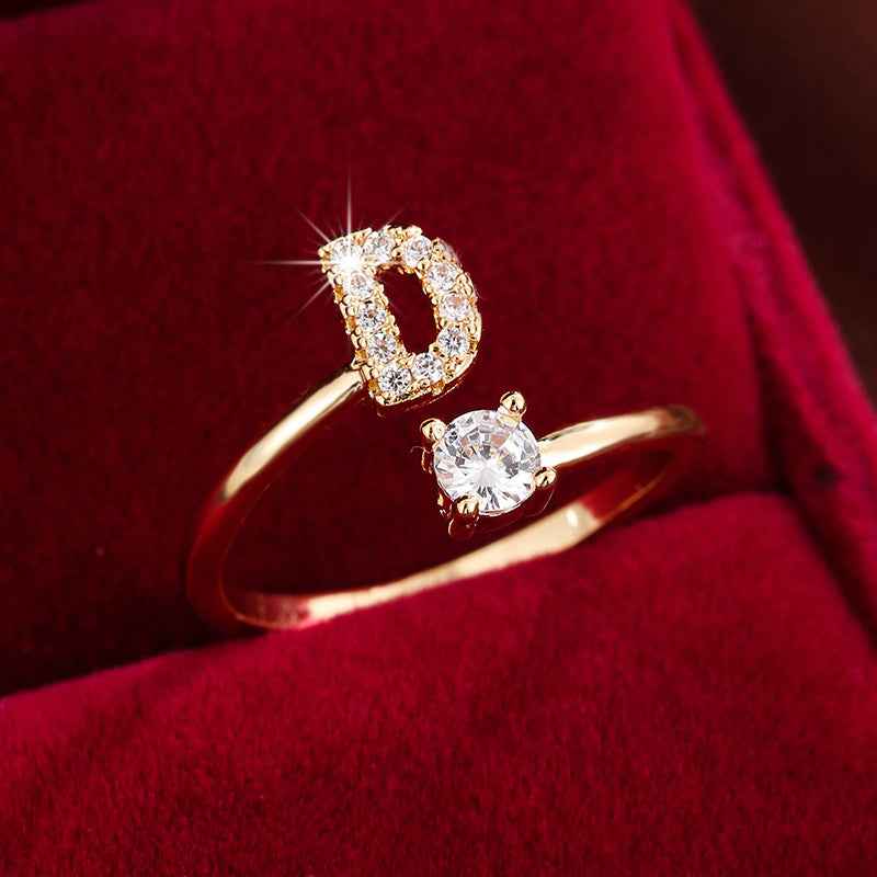 Fashionable 26 English Letters Four-Prong Synthetic Synthetic Zirconia Open Adjustment Ring D Golden