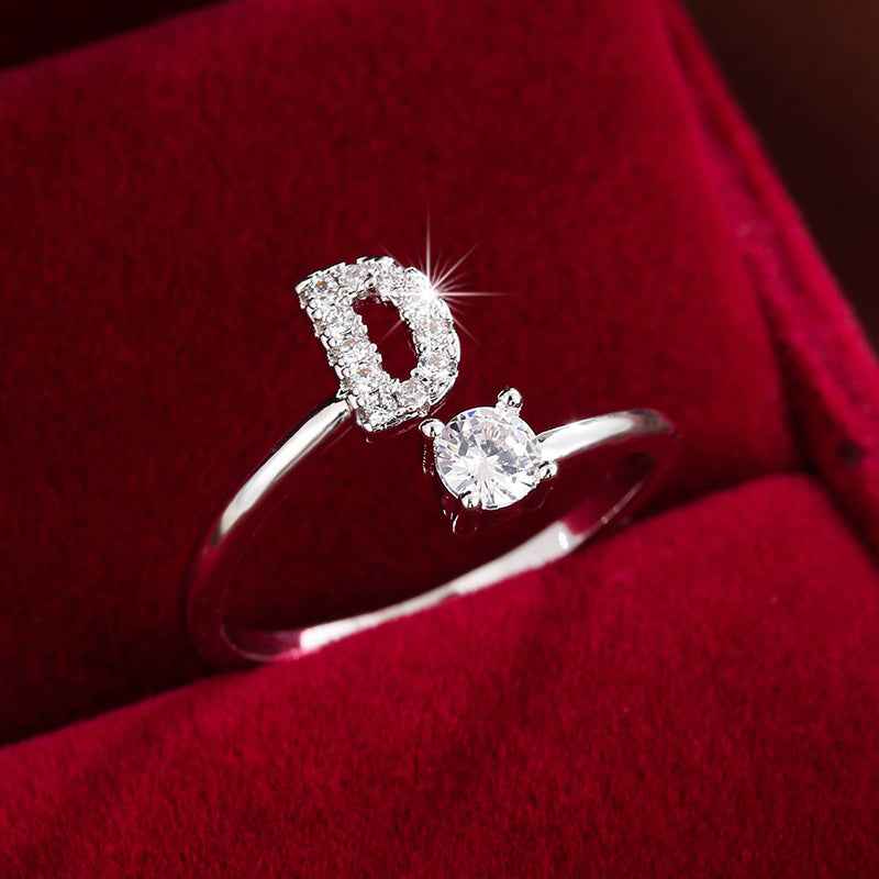 Fashionable 26 English Letters Four-Prong Synthetic Synthetic Zirconia Open Adjustment Ring D Silvery