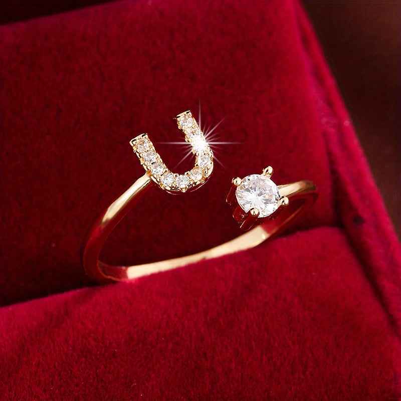 Fashionable 26 English Letters Four-Prong Synthetic Synthetic Zirconia Open Adjustment Ring Ｕ Golden