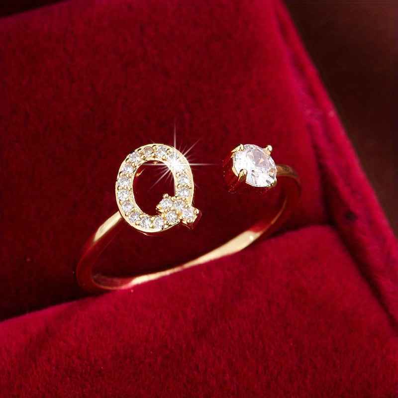 Fashionable 26 English Letters Four-Prong Synthetic Synthetic Zirconia Open Adjustment Ring Ｑ Golden