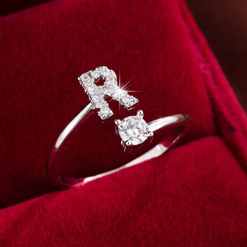 Fashionable 26 English Letters Four-Prong Synthetic Synthetic Zirconia Open Adjustment Ring Ｒ Silvery